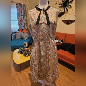 Floral Sleeveless Dress with Bow Accent